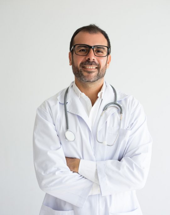 portrait-successful-mid-adult-doctor-with-crossed-arms