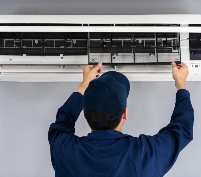 repairman-doing-air-conditioner-service (1)